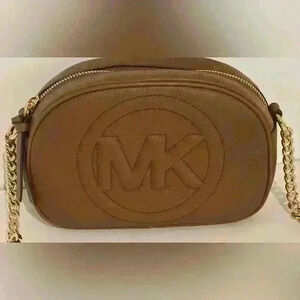 A Michael Kors Brynn small pebbled leather crossbody bag.